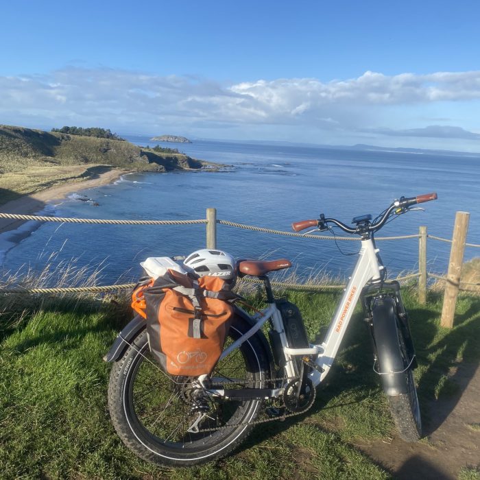 Electric hire bike on coastline route near North Berwick
